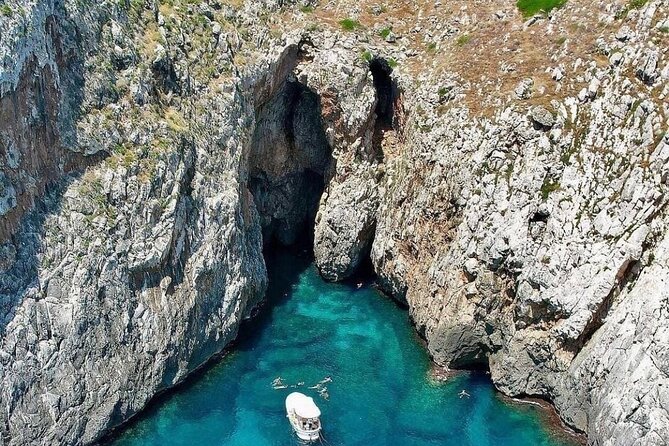 3 Hour Group Tour by Boat to the Caves of Santa Maria di Leuca - The boat, the captain, and the human side of the trip