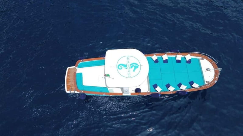 Amalfi: Boat Adventure Caves, Beaches, Snorkeling & Positano - Secret stop, snorkeling, and the ride back