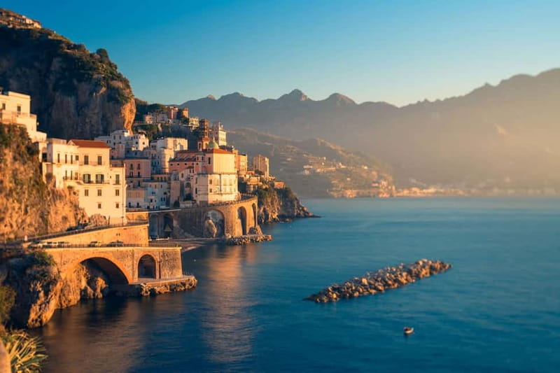 Amalfi: Sunset Boat Tour with Fruit and Drinks - Conca dei Marini and the story behind Santa Rosa