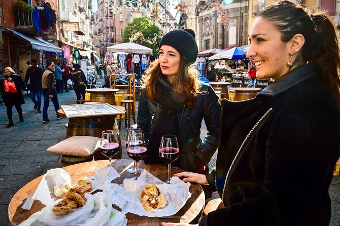 Authentic Naples Food Tour with 8+ Tastings of Pizza, Wine & More - Via dei Tribunali, pizza, and the central food stop