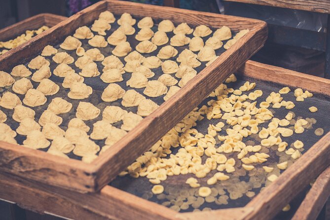 Bari Walking Tour with Pasta Experience - Piazza Ferrarese and the Roman road beneath your feet