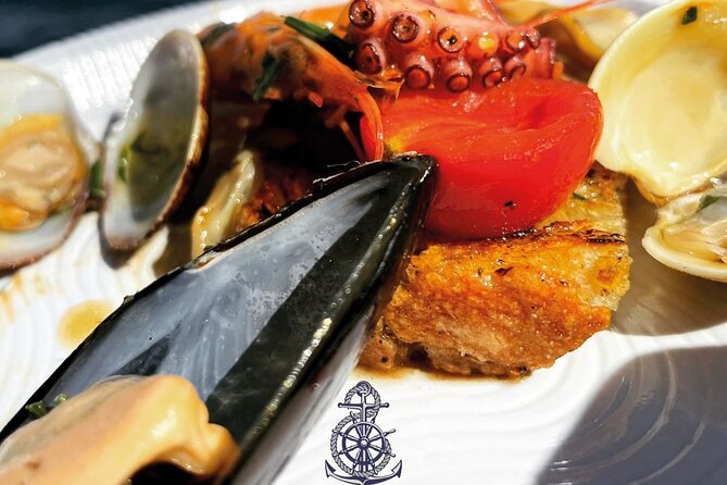 Boat excursion with lunch on board to discover Ischia - Forio begins with the Church of Soccorso