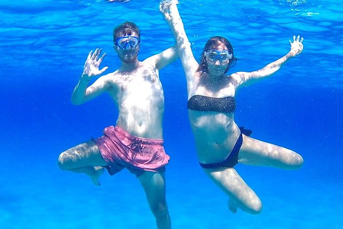 Boat Tour Egadi Day discover Favignana and Levanzo from Trapani - Cala Rossa is the day’s big swimming stop
