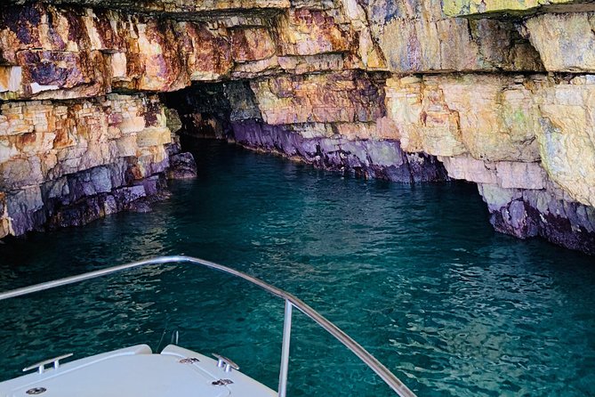 Boat tour of the Polignano a Mare caves with aperitif - Why the coast looks better from a boat