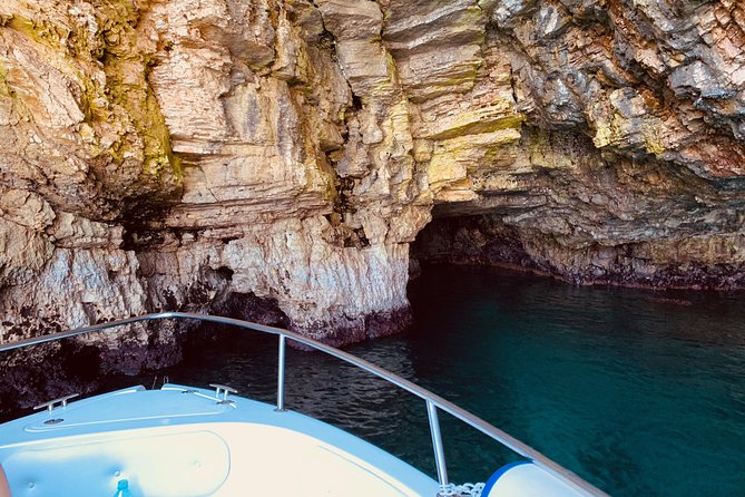 Boat tour of the Polignano a Mare caves with aperitif - Lama Monachile, Polignano’s famous postcard