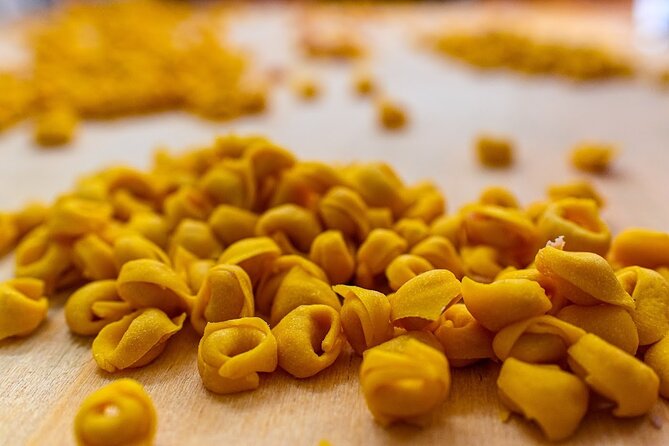 Bologna Food & Market Tour with 6 Tastings, Pasta, Wines & More - Cold cuts, wine, gelato, and the secret dish