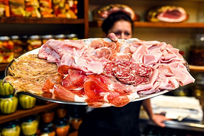 Bologna Food & Market Tour with 6 Tastings, Pasta, Wines & More - Meeting Bologna at Palazzo della Mercanzia