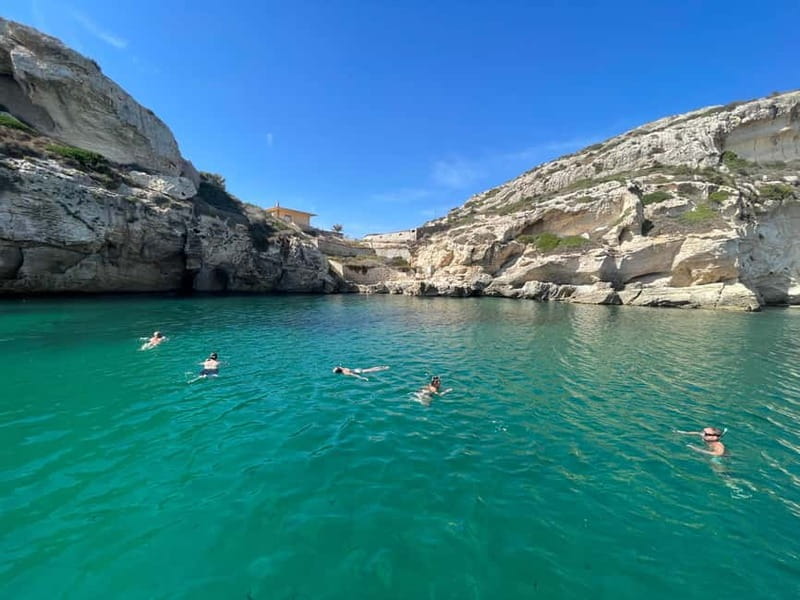 Cagliari: Boat Tour with 4 Swim Stops, Snorkeling & Prosecco - How the Four Swim Stops Are Chosen