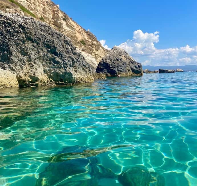 Cagliari: Boat Tour with Snorkeling, GoPro & Sardinian Beer - Cala Mosca: your first proper swim