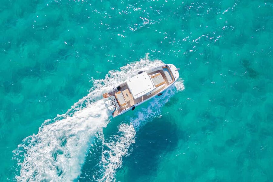 Cagliari: Luxury Motorboat Tour with 3 Swim Stops & Wine - Cala Fighera: more time for swimming and snorkeling