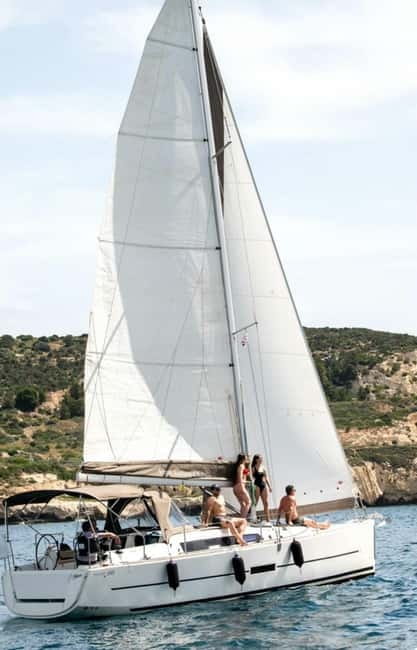 Cagliari: Sailing Tour with 4 Stops, Snorkeling and Prosecco - What the four coastal stops are really like