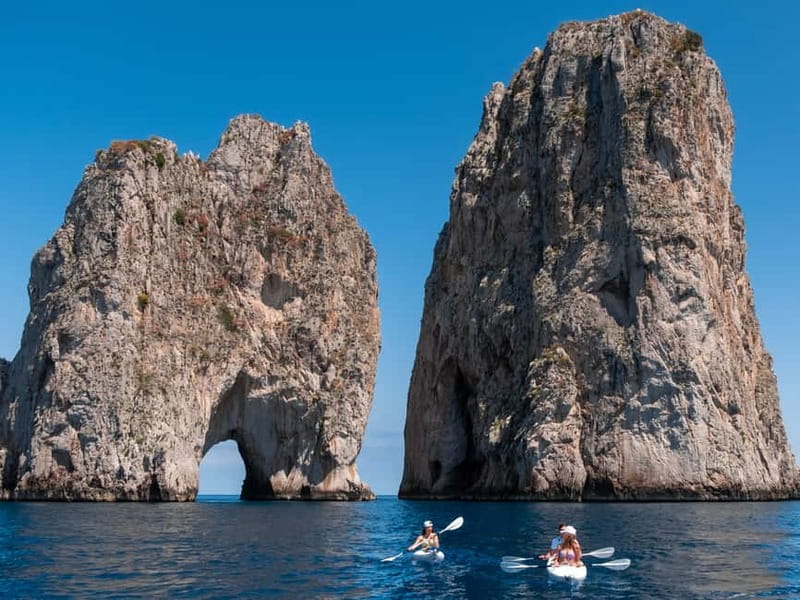 Capri: Caves and Beaches Kayaking Tour with GoPro Photos - The arch of the star and the Faraglioni
