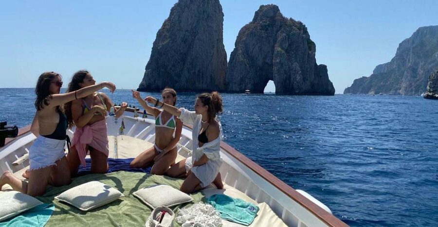 Capri: Island and Grottos Boat Cruise with Snacks and Drinks - Natural Arch, Casa Malaparte, and Punta Carena