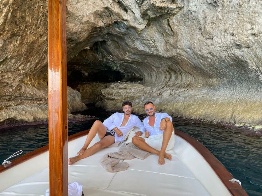 Capri: Island and Grottos Boat Cruise with Snacks and Drinks - The swimming stop: fun, but usually brief