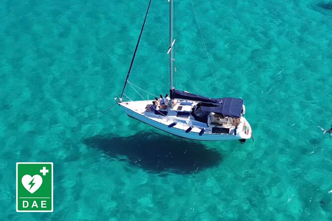 Catamaran tour stops bathing and snorkeling toast with prosecco - The first bay, Capo Sant’Elia, and old military sites