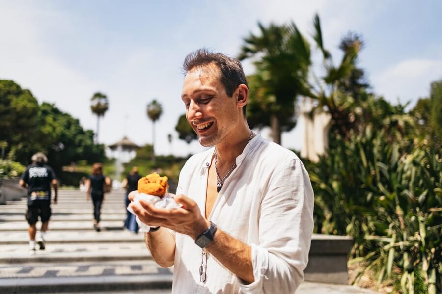Catania: Guided Street Food Walking Tour - Via Crociferi begins the walk with Baroque drama