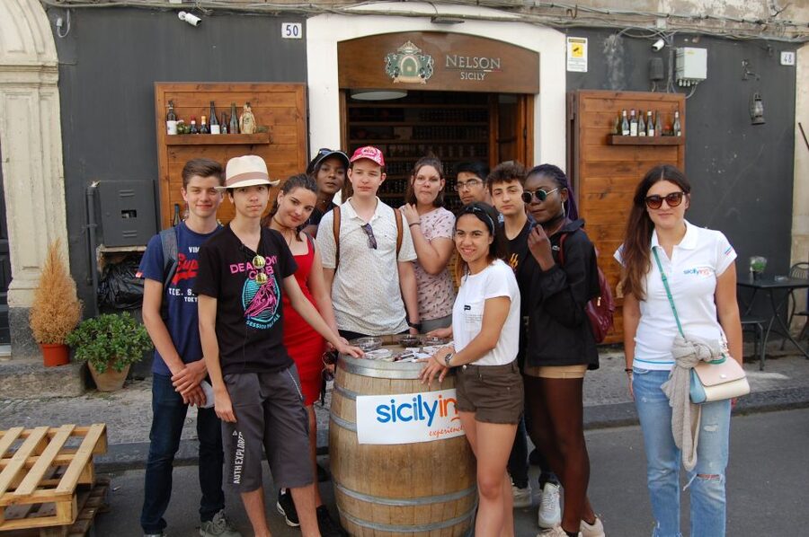 Catania: Guided Street Food Walking Tour - Via Etnea leads toward the second market stop