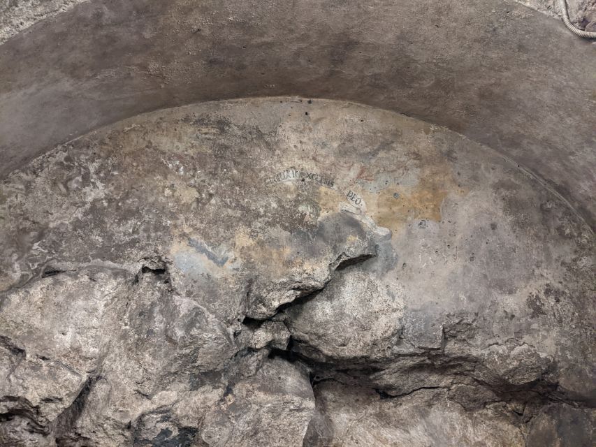 Catania: Underground Catania Tickets and Guided Tour - Church crypts, relics, and uneasy stories