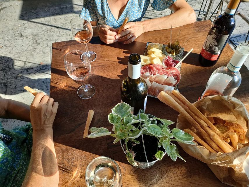 Cavaion: Lake Garda Wine & Food Tasting with Vineyard Tour - Walking through the vines and olive trees