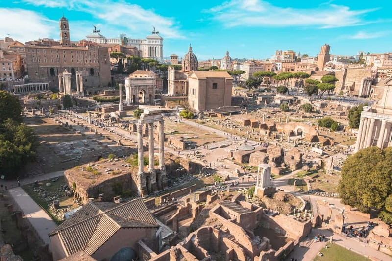 Colosseum, Roman Forum & Palatine Hill Entry and Audioguide - Walking through the Roman Forum