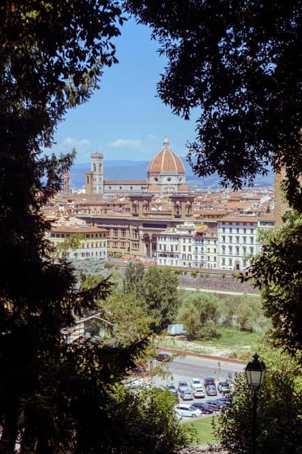 Florence: Eco-Friendly Golf Cart City Tour with Audio Guide - Across Ponte Santa Trinita into the Oltrarno