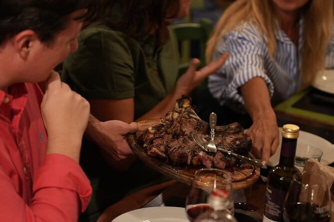 Florence Evening Food Tour with Florentine Steak & Tuscan Wine - A wine window with a Renaissance backstory