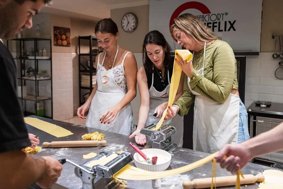 Florence: Handmade Pasta & Dessert Class with Unlimited Wine - Rolling dough, cutting pasta, and shaping gnocchi