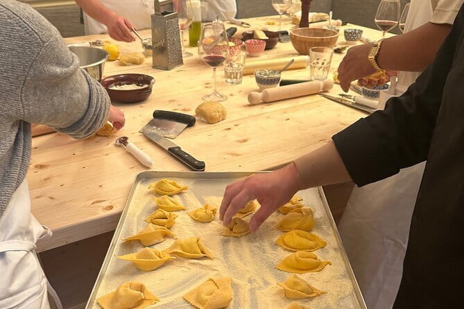 Florence: Pasta Cooking Class with Unlimited Wine - Making pasta beside Florence Cathedral