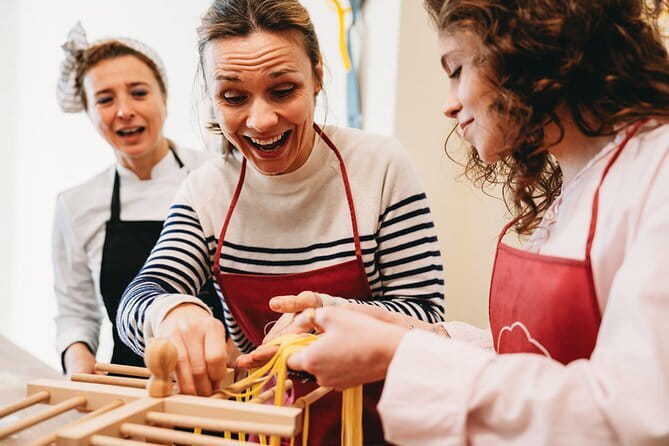 Florence: Pasta Cooking Class with Unlimited Wine - Tuscan wine, soft drinks, and the social side