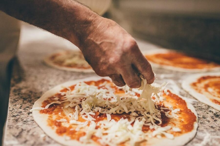 Florence: Pizza and Gelato Experience with Unlimited Wine - Sitting down for pizza, gelato, and unlimited wine