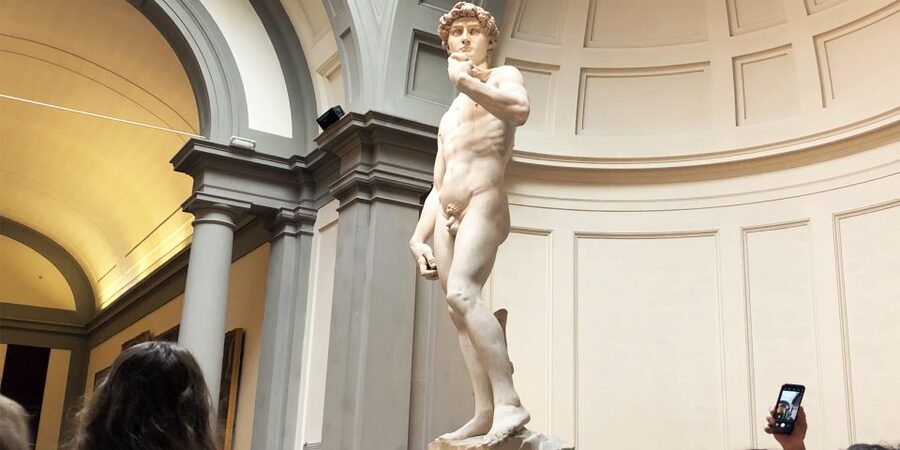 Florence: Timed Entry Ticket to Michelangelo's David & eBook - Collecting your ticket near the Accademia