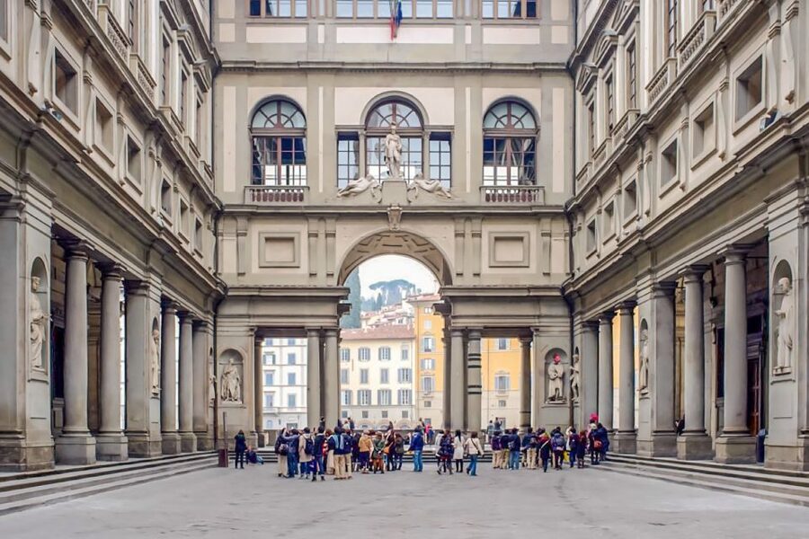 Florence: Uffizi Priority Ticket & Masterpieces Audio App - Meeting the host beside the Cellini statue