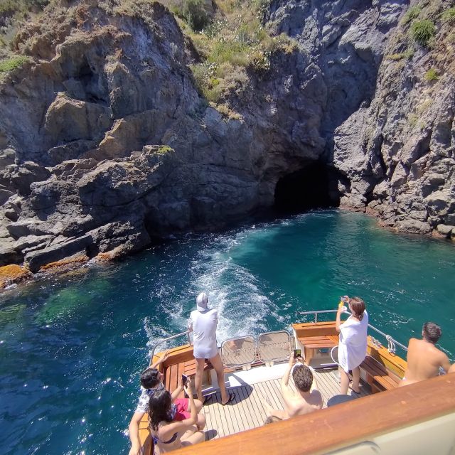 Forio: Ischia Island Boat Tour with Local Lunch and Swimming - San Montano, fruit, dessert, and local drinks
