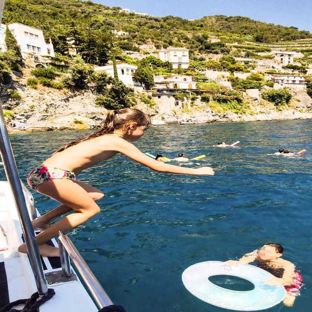 From Amalfi: Coast & Furore Fjord Boat Tour with Swim Break - Finding the boat at Amalfi pier