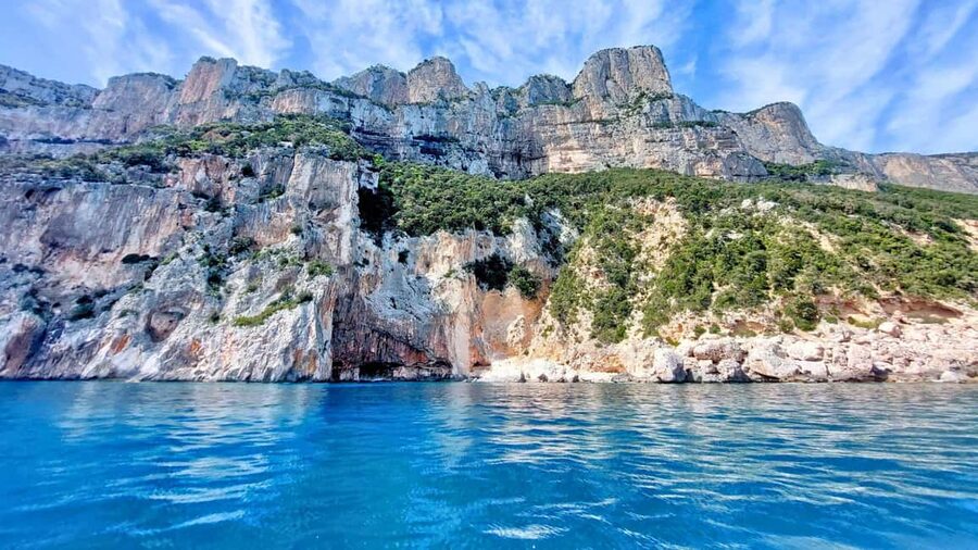 From Cala Gonone: Gulf of Orosei Dinghy Trip - Skippers who shape the day