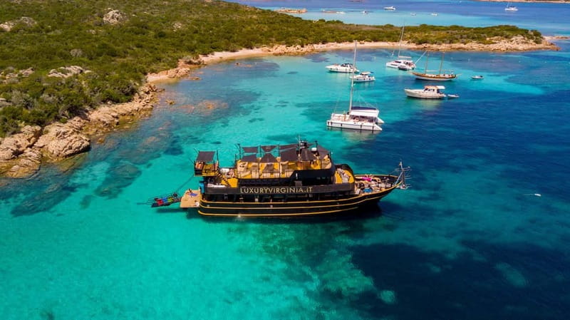 From Cannigione: La Maddalena Archipelago Boat Trip - Pink Beach from the water
