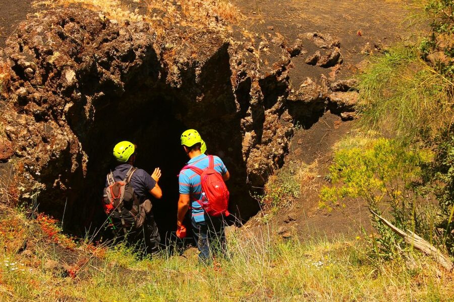 From Catania: Mt. Etna, Wine and Alcantara Tour - Inside a lamp-lit lava cave