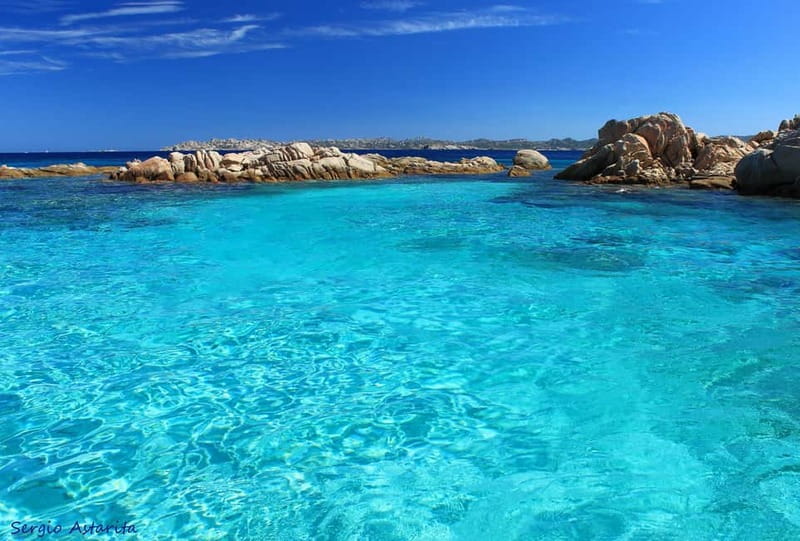 From Palau: 4 stops boat tour to La Maddalena archipelago - A long beach break at Santa Maria