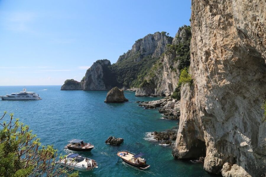 From Positano: Sorrento Coast & Capri Full-Day Trip by Boat - Caves and rock formations around Capri