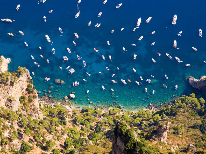From Sorrento: Capri and Blue Grotto Boat Tour - Capri’s grottoes and famous rock formations