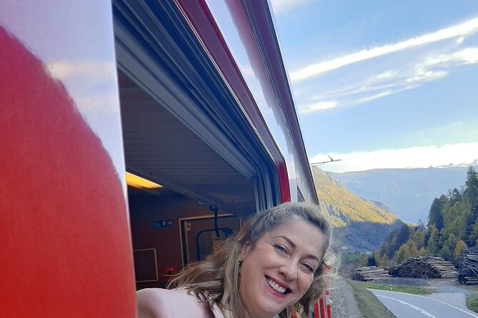 Intimate Small-Group Bernina UNESCO Scenic Train on Swiss Alps - The Bernina railway: open windows, bridges, and high snow