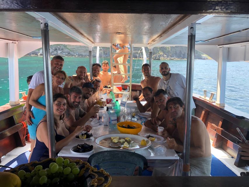 Ischia: Island Boat Tour with Neapolitan Lunch & Snorkeling - The day at a glance