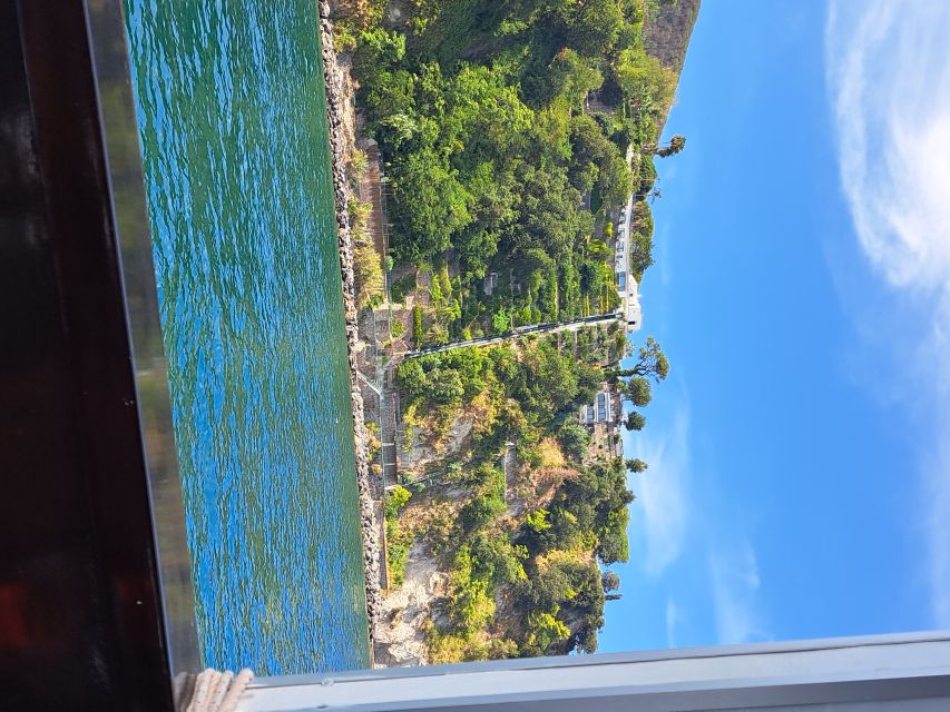 Ischia: Island Boat Tour with Neapolitan Lunch & Snorkeling - The Green Grotto is the centerpiece