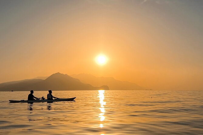 Kayak tour in Capri between caves and beaches. Photos included. - The Green Grotto and the optional swim