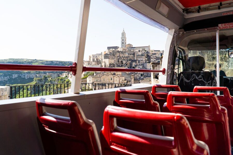 Matera: Open Top Bus Tour with Entrance to Casa Grotta - Piazza Vittorio Veneto and two sides of Matera