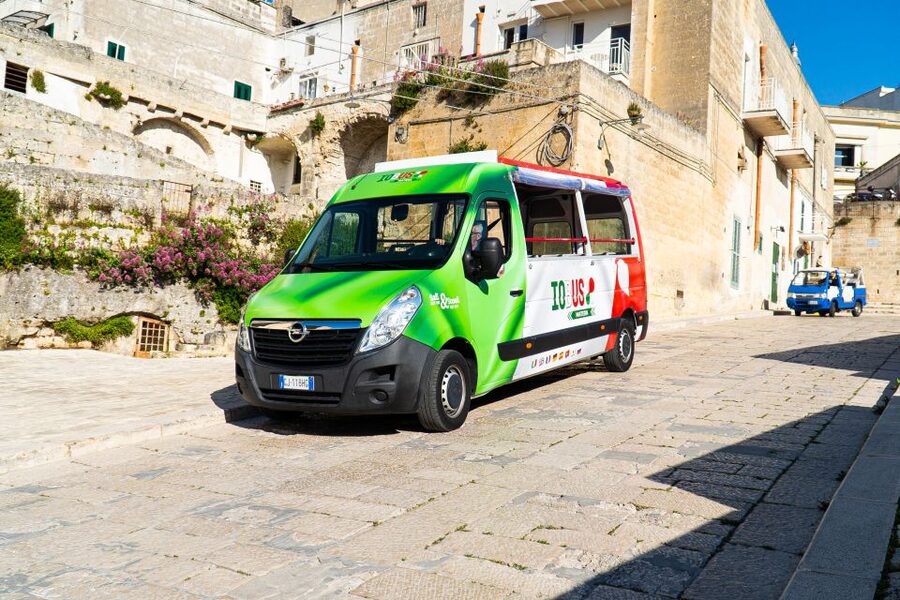 Matera: Open Top Bus Tour with Entrance to Casa Grotta - Piazza San Pietro Caveoso after sunset