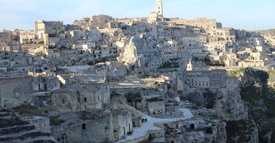 Matera: Sassi Tour with Entry to Rock Houses and Churches - Through Matera’s historic center to Piazza Duomo