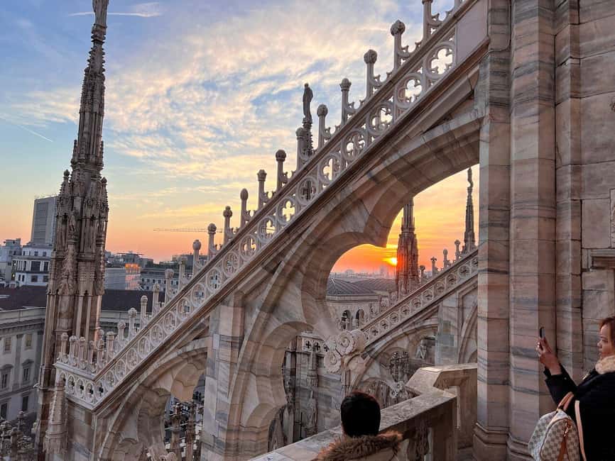 Milan Duomo Rooftops Tour + Optional Hop-on-Hop-off ticket - Riding up, then climbing the final 50 steps