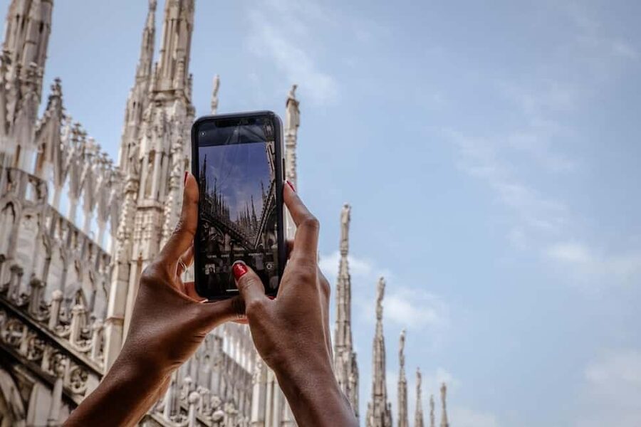 Milan: Priority Access Duomo and Rooftop Tour - Looking across Milan from the marble roof
