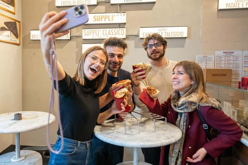 Milan: Sunset Navigli Food & Drinks Tour with a Local - The second stop: Italian wine, cheese, and small plates